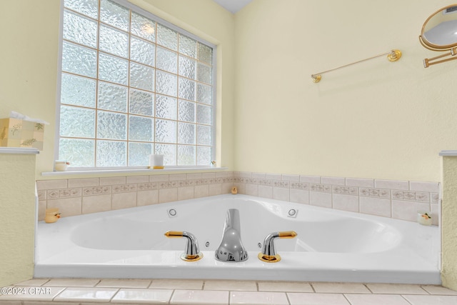 bathroom with tiled tub