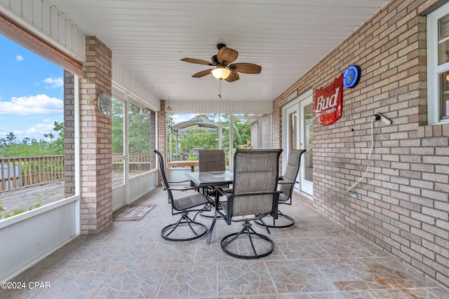 view of patio / terrace featuring ceiling fan