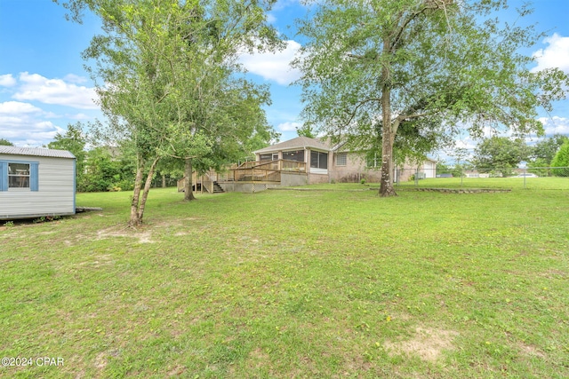 view of yard featuring a deck