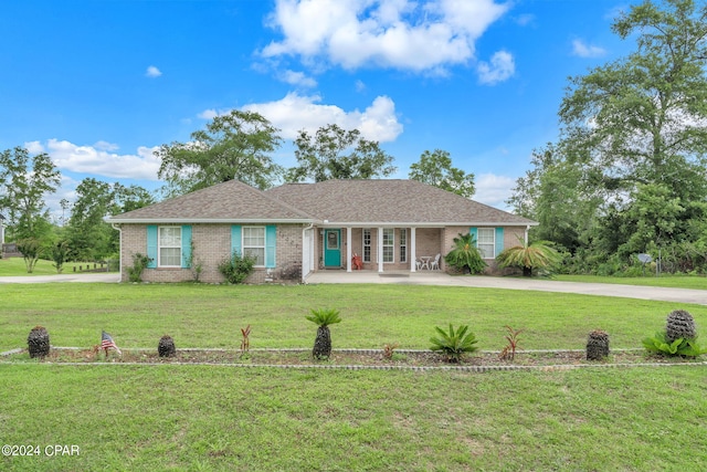 ranch-style house with a front lawn