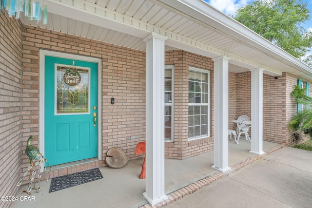 property entrance with a porch