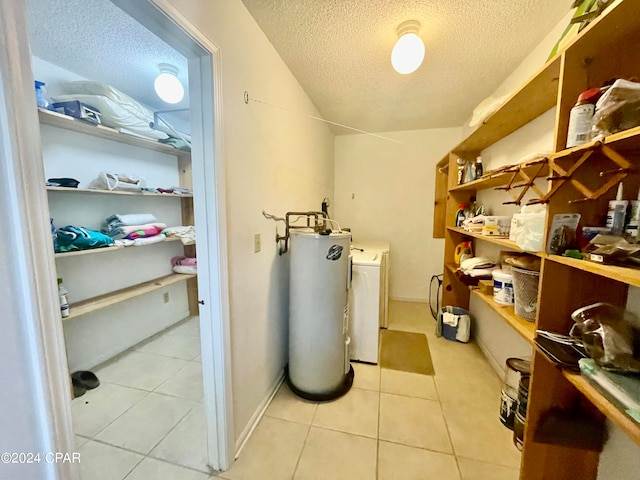 utility room featuring electric water heater