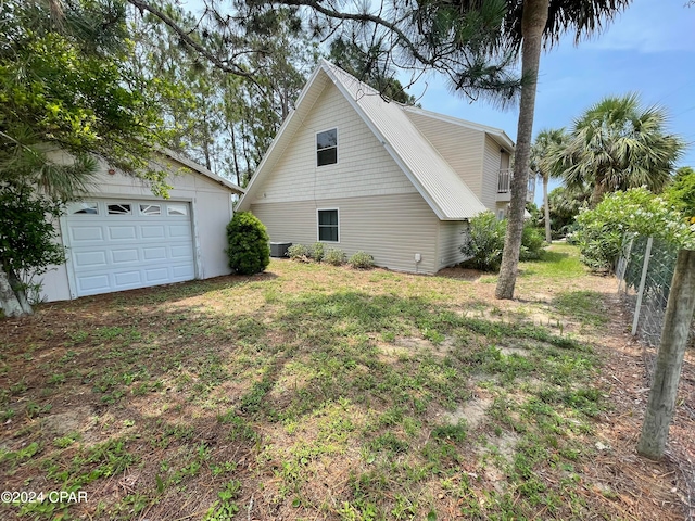 view of home's exterior featuring a garage