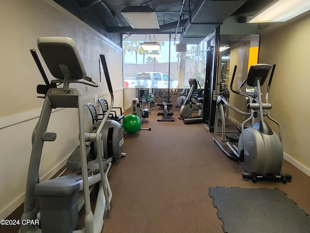 exercise room with carpet floors