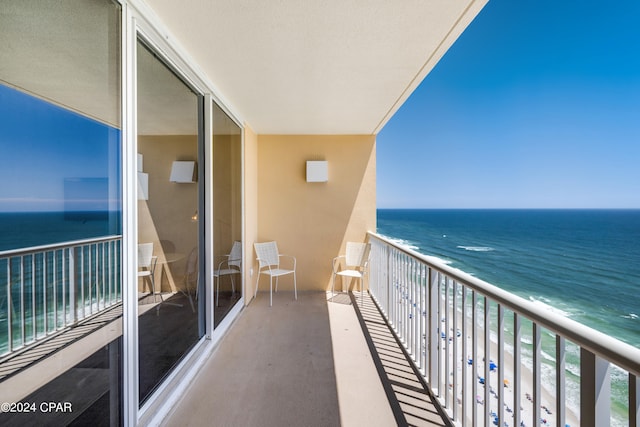 balcony featuring a water view