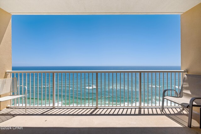 balcony featuring a water view