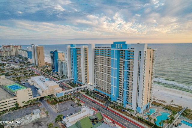 aerial view at dusk with a water view