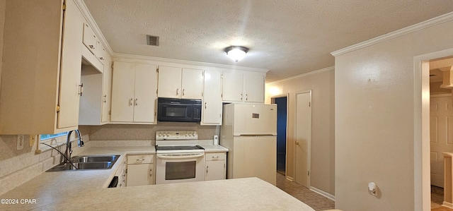 kitchen with crown molding, white appliances, a textured ceiling, light tile floors, and sink