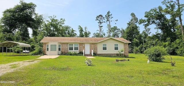 ranch-style house featuring a front yard and a carport