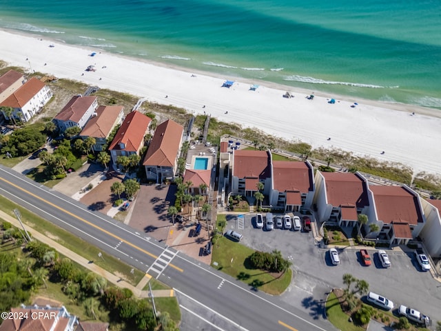 bird's eye view with a beach view and a water view