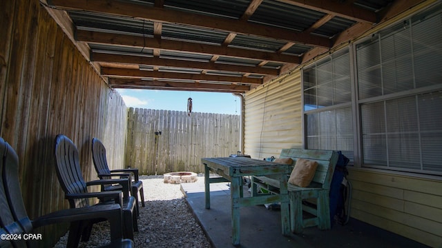 view of patio / terrace featuring an outdoor fire pit