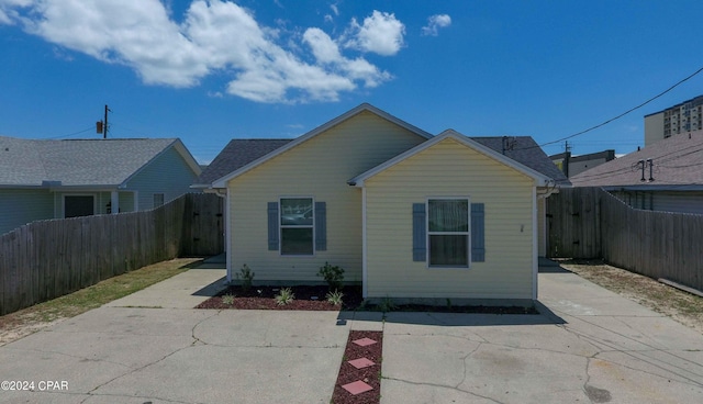 rear view of house featuring a patio