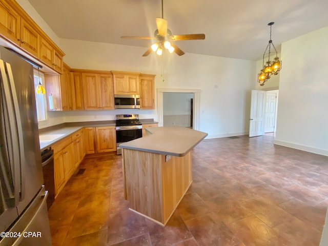 kitchen featuring a center island, high vaulted ceiling, stainless steel appliances, and ceiling fan