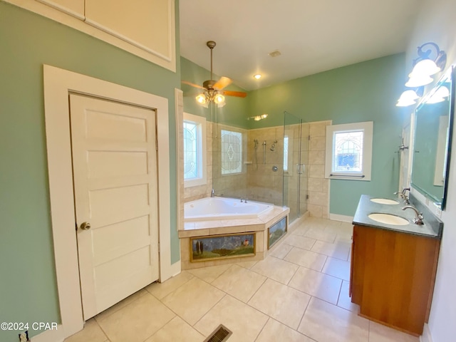 bathroom featuring tile patterned floors, ceiling fan, shower with separate bathtub, and vanity