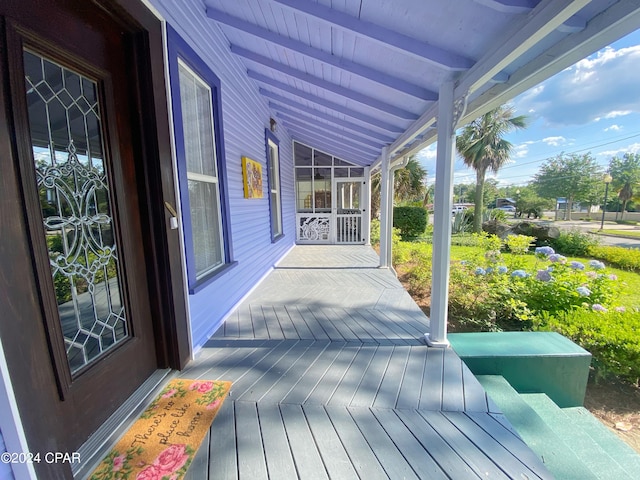 deck featuring covered porch