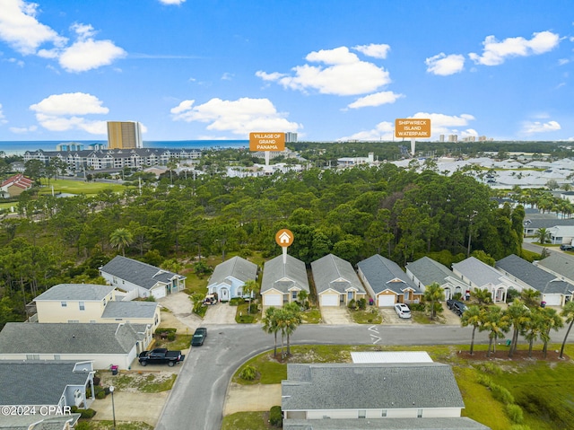 birds eye view of property with a residential view