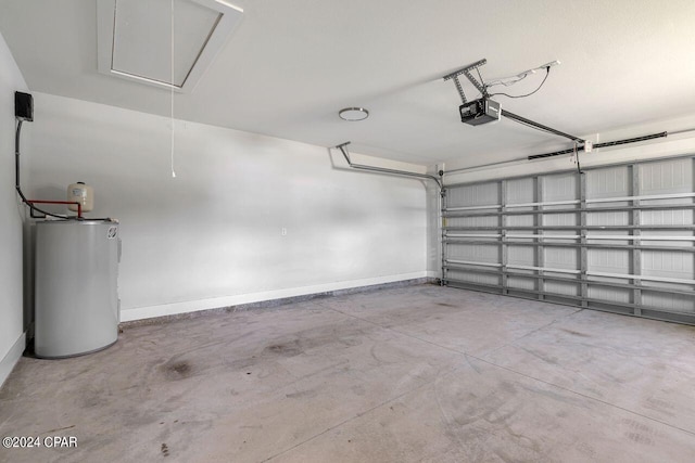 garage featuring a garage door opener and water heater