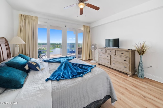 bedroom with light hardwood / wood-style flooring, ceiling fan, and access to outside