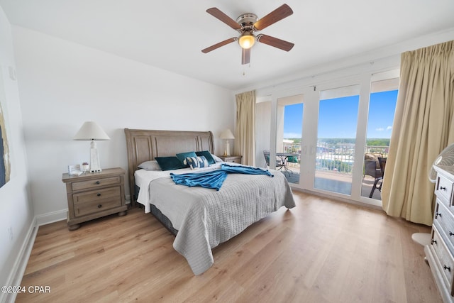 bedroom featuring light wood-type flooring, access to outside, and ceiling fan