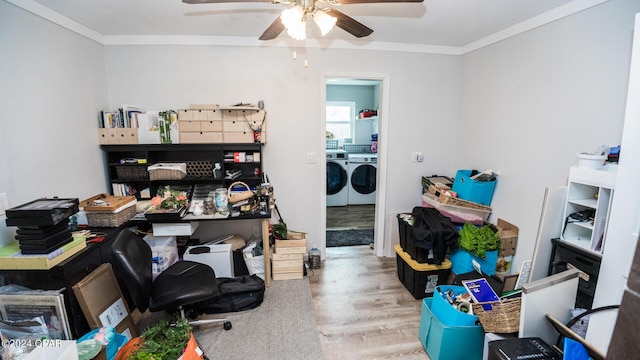 office area with crown molding, light hardwood / wood-style flooring, ceiling fan, and independent washer and dryer