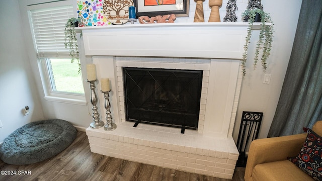 interior details with a fireplace and hardwood / wood-style floors