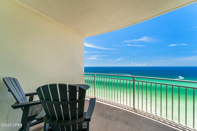 balcony featuring a water view