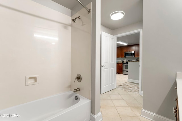 bathroom featuring shower / tub combination and tile flooring