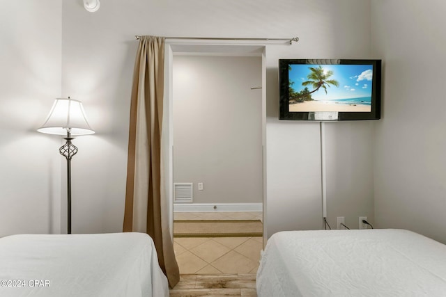 bedroom featuring hardwood / wood-style floors