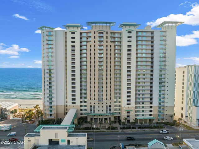 view of building exterior with a water view