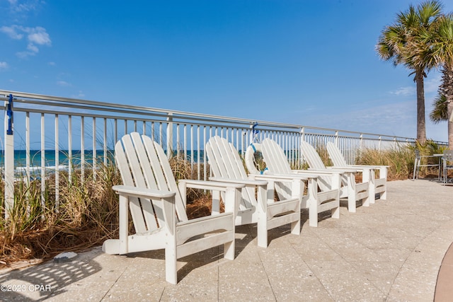 view of patio / terrace featuring a water view