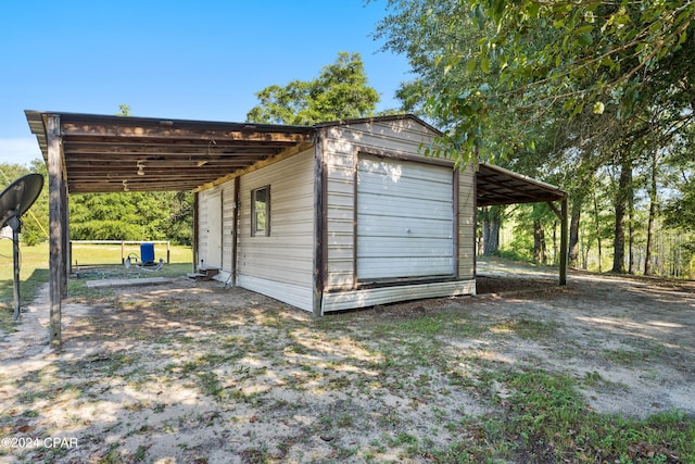 garage with a carport