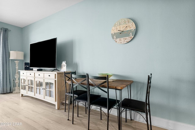 dining space featuring light hardwood / wood-style floors