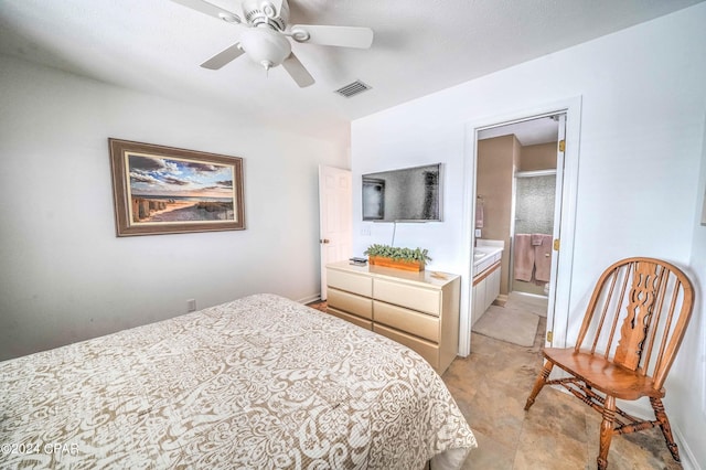 bedroom featuring light tile patterned flooring, connected bathroom, and ceiling fan