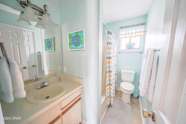 full bathroom with vanity, shower / tub combo with curtain, toilet, and tile patterned floors