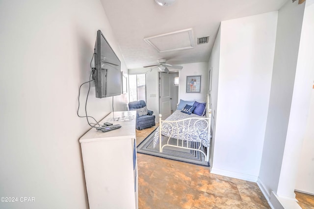 tiled bedroom featuring ceiling fan