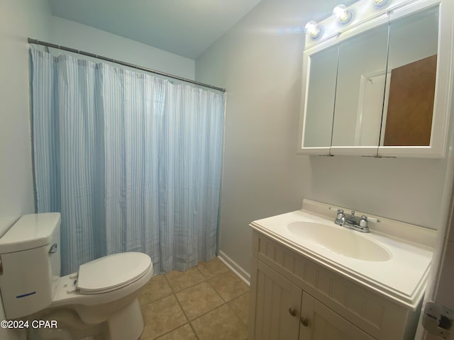 bathroom with a shower with curtain, tile patterned flooring, vanity, and toilet