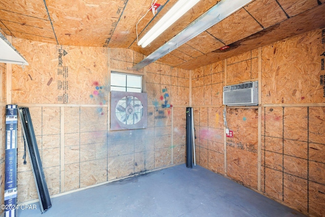 storage area featuring an AC wall unit