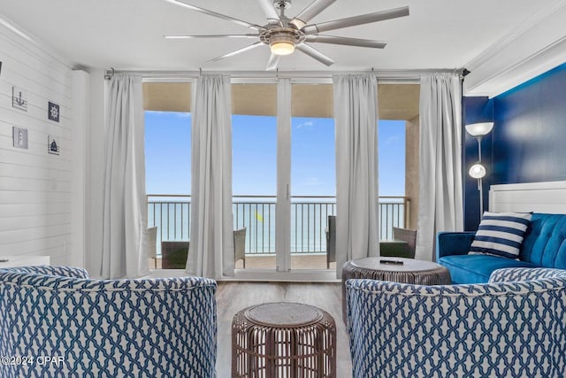 living room with hardwood / wood-style floors and ceiling fan