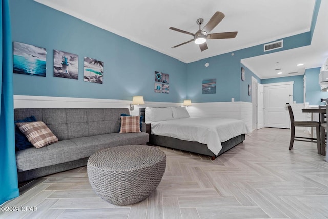 bedroom featuring light parquet floors and ceiling fan