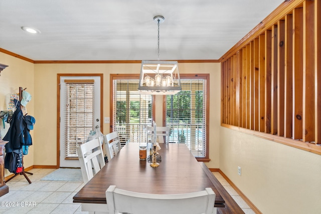 tiled dining room with crown molding and an inviting chandelier