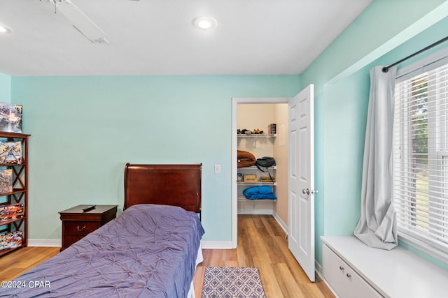 bedroom featuring a closet and light hardwood / wood-style floors