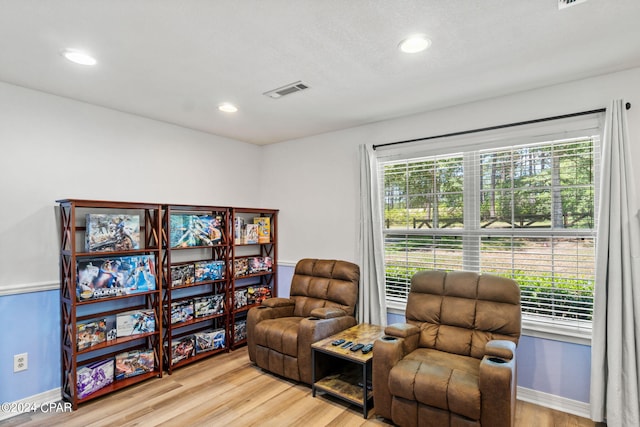 living area featuring light hardwood / wood-style flooring