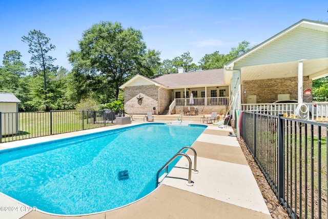 view of pool featuring a patio area