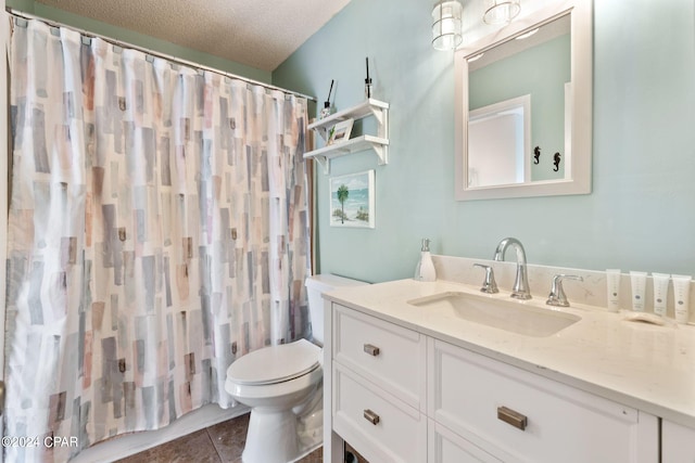 bathroom with toilet, vanity, tile patterned flooring, a textured ceiling, and a shower with shower curtain