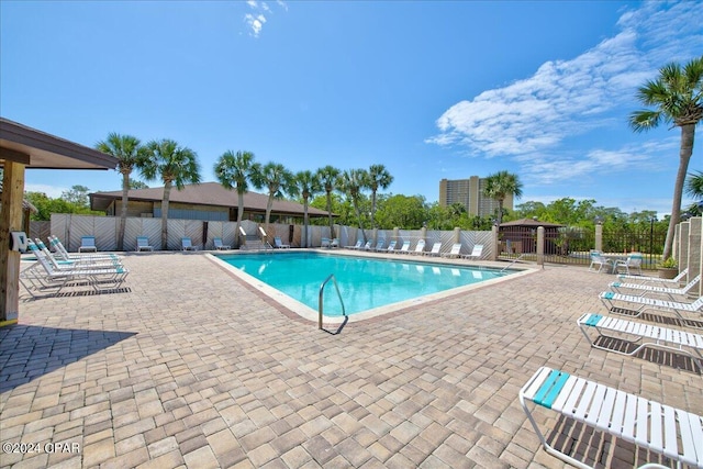 view of pool featuring a patio