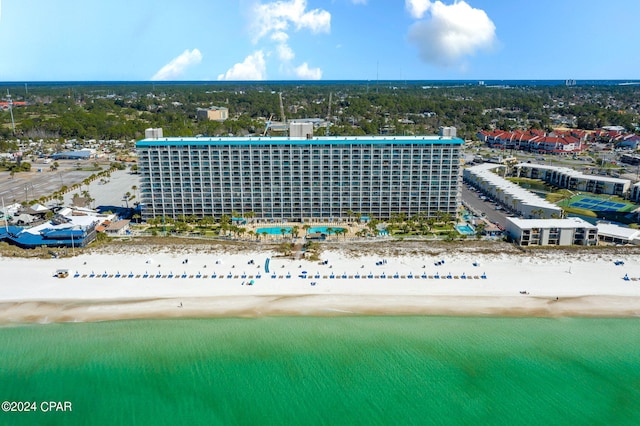 bird's eye view featuring a beach view and a water view