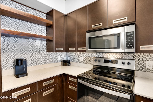 kitchen with appliances with stainless steel finishes, backsplash, and dark brown cabinetry