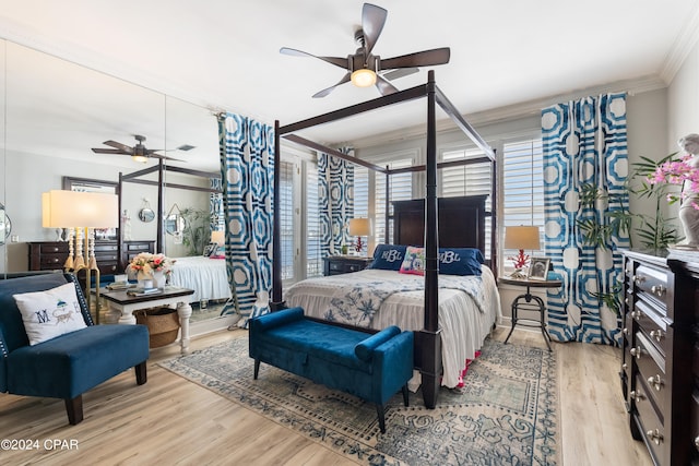 bedroom with ceiling fan, light hardwood / wood-style flooring, and ornamental molding