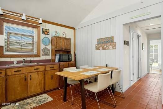 208 3rd St Unit 1/2, Panama City Beach, FL 32413 - dining space featuring lofted ceiling