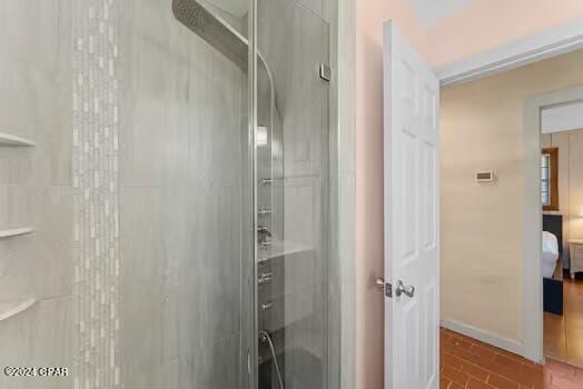 208 3rd St Unit 1/2, Panama City Beach, FL 32413 - full bath with a stall shower and baseboards